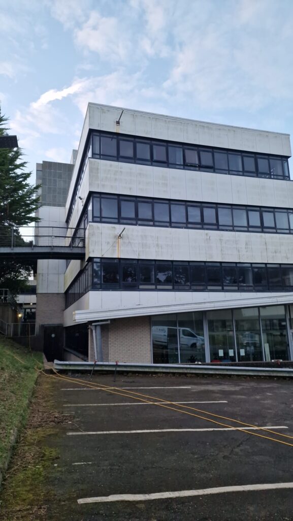 Before: Building exterior cleaning