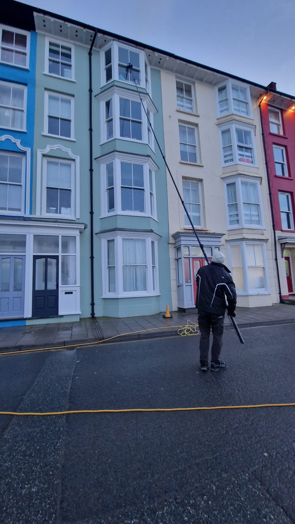 Water-fed pole window cleaning on Aberystwyth seafront